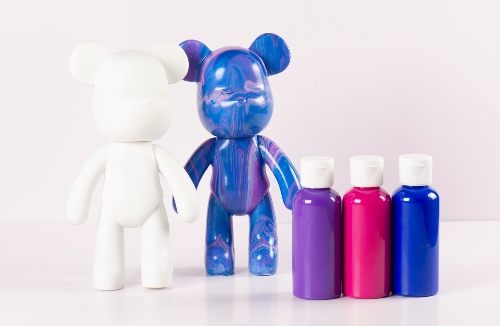 Blank Bear with blue, purple and white fluid art bear from the DIY Bear Kits at Fifth Unicorn, creative fluid art workshops in Newport, North Brisbane and online DIY art kits posting Australia wide.